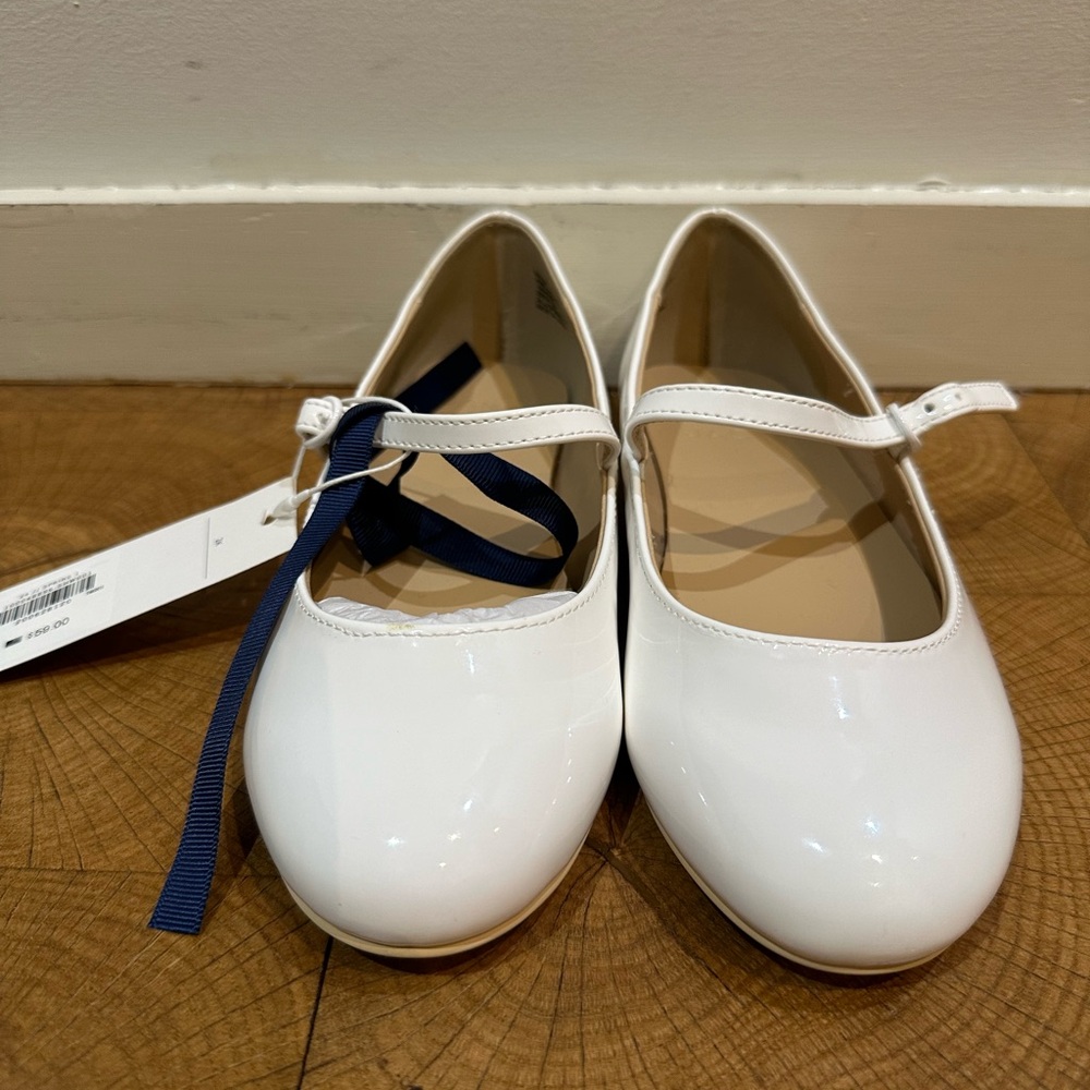 Girls white brand new ballet flats.